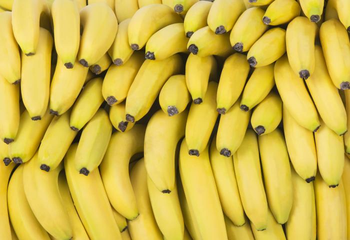 Viele gelbe Bananen eng aneinander liegend